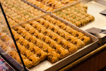 Baklava honey with walnut and pistachio. Assortment baklava in Turkish market.