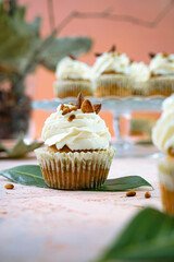 Maffin cake cupcake with white cream autumn green leaf