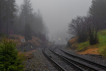 Fototapeta premium Railroad track near Jedlova station in Luzicke mountains in autumn morning
