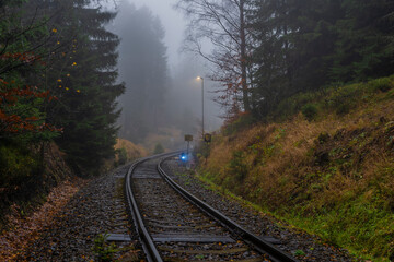 Railroad track near Jedlova station in Luzicke mountains in autumn morning