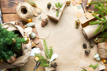 Background with copyspace for Christmas and new year in eco-friendly materials: kraft paper, gift...