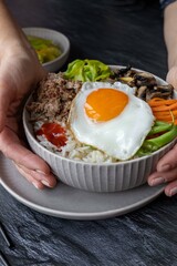 Traditional Korean dish- bibimbap: rice with vegetables and ground beef
