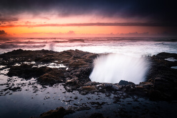 Sunset above Thor's well on Oregon coast