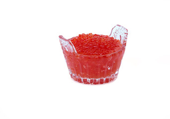 Red caviar in a glass vase isolated on a white background.