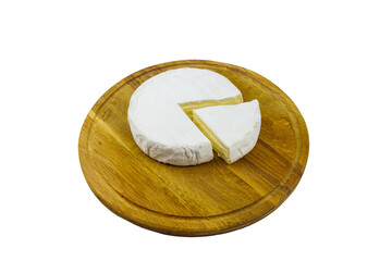 Piece of brie cheese on cutting board isolated on white background