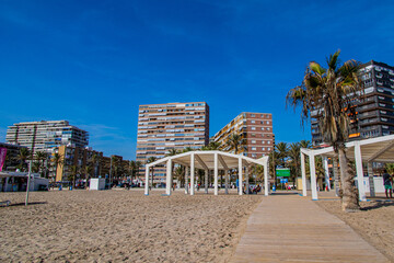 seaside landscape with a beach in the Spanish city of Alicante on a warm sunny day