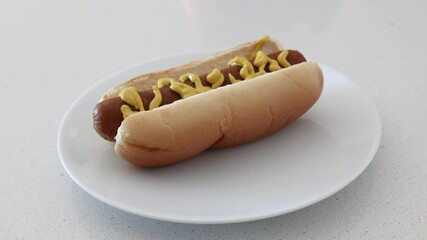 Serving a Meatless Hot Dog with Mustard