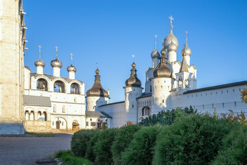 Fototapeta na wymiar Rostov Veliky Kremline wall, the gateway Church of the Resurrection with a fortified tower and Assumption Cathedral Belfry