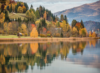 autumn landscape with lake and mountains