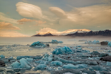 Icebergs in the Jokulsarlon lake in Vatnajokull National Park at sunrise, Iceland