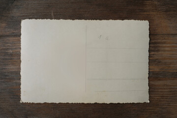 empty mock up background of old wood, set of vintage photos with blank, back side of the photo, concept family genealogy, memories, generational ties, museum historical materials