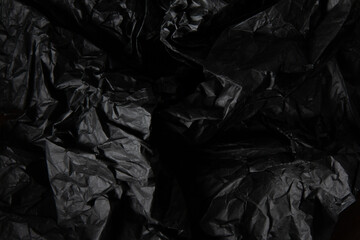 Crumpled black paper texture