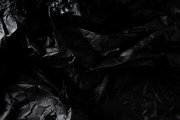Crumpled black paper texture