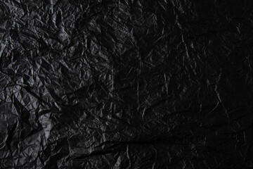 Crumpled black paper texture