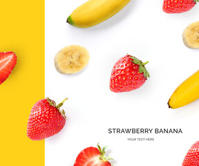 Creative layout made of strawberry  and bananas on the yellow and white background. Flat lay. Food concept.
