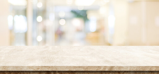 Empty brown cement table over blur store background, product display montage