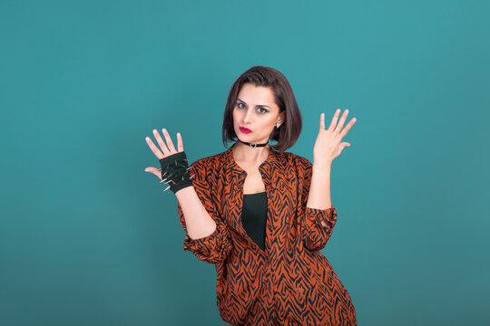 Young beautiful woman in 90s style lost her glove