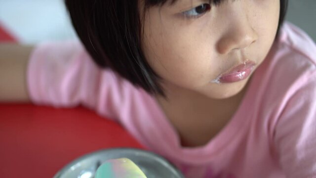 Malaysian Chinese Girl Eat Ice Cream