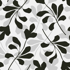 Simple botanical seamless pattern. Silhouettes of tropical leaves. Minimalistic monochrome design for fabric, wallpaper, packaging, background.