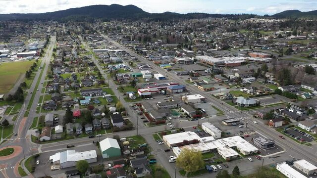 Cinematic 4K aerial drone panning shot of Midtown and Old Town of Anacortes with the waterfront of this small, charming, quaint old town near Seattle, Washington