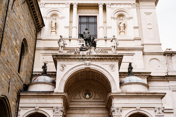 Statues above the entrance to Cappella Colleoni. Bergamo, Italy