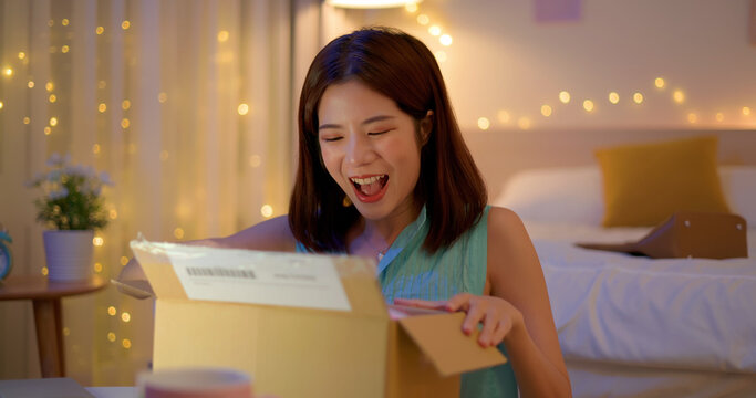 woman open delivery boxes