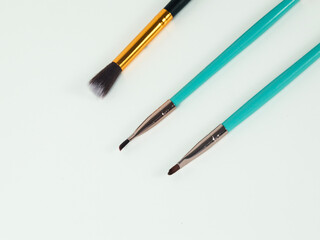 makeup brush medium close up on white background
