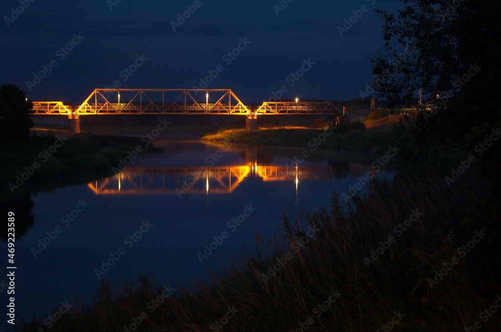 Wall mural river venta and railway bridge in summer night, skrunda, latvia.