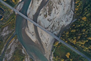 Aerial view of bridge road with cars over Laba river at sunrise in autumn, Mostovskoy, Krasnodar...