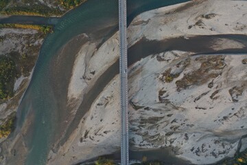 Aerial view of bridge road with cars over Laba river at sunrise in autumn, Mostovskoy, Krasnodar...