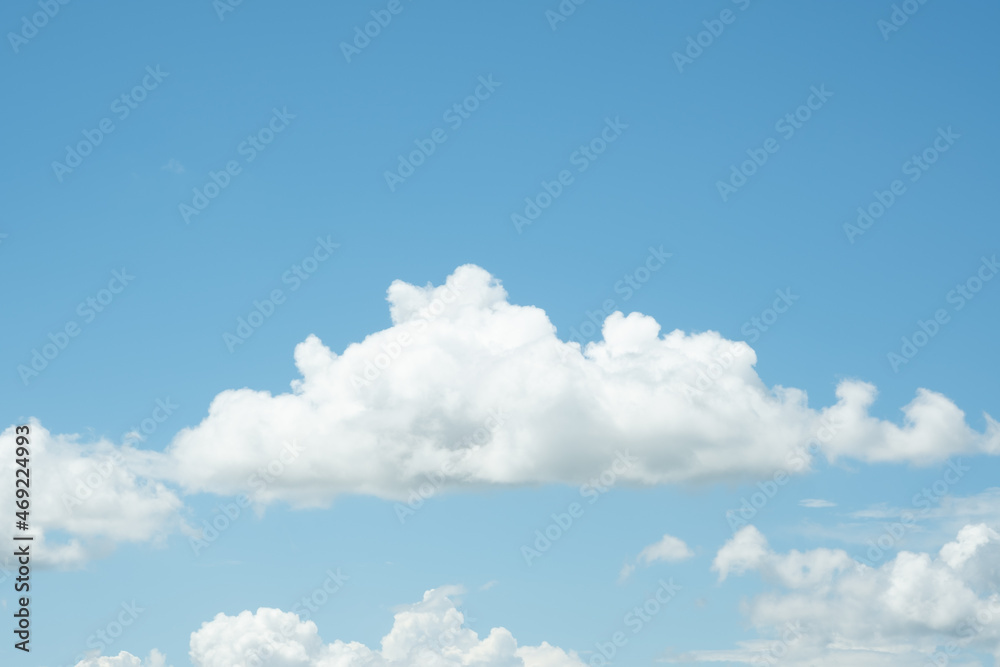 Wall mural many small clouds in blue sky.summer cloudy.white clouds floating in the sky.