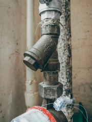 Coarse filter on a water pipe in the house. Mud filter. Plumbing. Selective focus