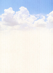 Grunge background with striped cardboard texture and white clouds. Vertical vintage nature backdrop