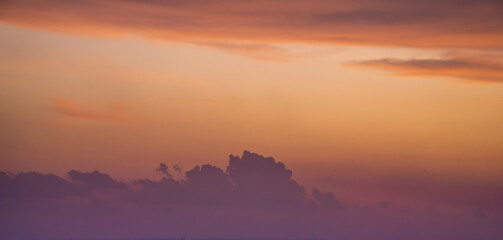Beautiful view of sky with clouds at sunrise. Partly cloudy. Colorful sunset. Natural sky background texture, beautiful color.
