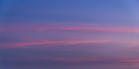 Beautiful view of sky with clouds at sunrise. Partly cloudy. Colorful sunset. Natural sky background texture, beautiful color.