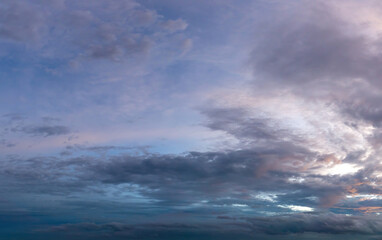Beautiful view of sky with clouds at sunrise. Partly cloudy. Colorful sunset. Natural sky background texture, beautiful color.