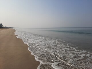beach and waves,  tropical beach, indian beach in goa, goa beach. - obrazy, fototapety, plakaty