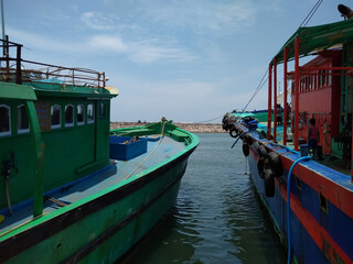 Fototapeta na wymiar boats in the harbor, Thengapattanam fishing Harbor, Kanyakumari district Tamilnadu, seascape view