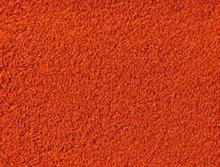 Red pepper powder all over the screen. Cayenne pepper. Paprika powder.