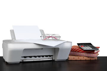 Printer and stack of books on black table against white background