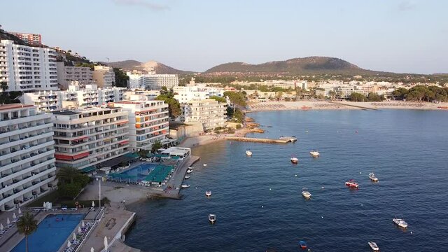 Here is a drone shot of the beautiful beach and hotels in Santa Ponsa, Balearic Islands, Majorca.