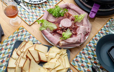 Raclette cheese and meat, french tradition