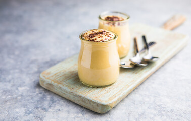 Custard cream in glasses with chocolate
