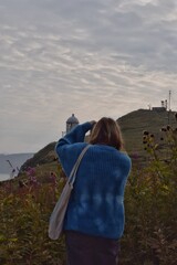 woman looking at the camera lighthouse