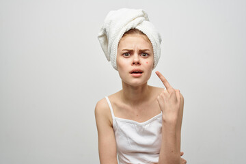 woman with a towel on my head hygiene treatment