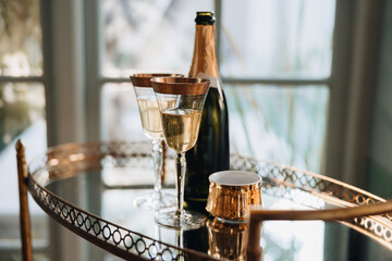 Alcoholic beverages placed on a glass table