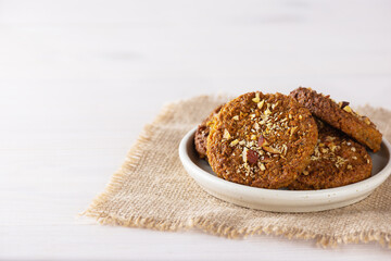 Homemade quinoa cookies in a bowl. Sugar, gluten and lactose free, vegan. Horizontal orientation, copy space.