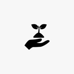 hand holding up a sprout icon. hand holding up a sprout vector icon on white background