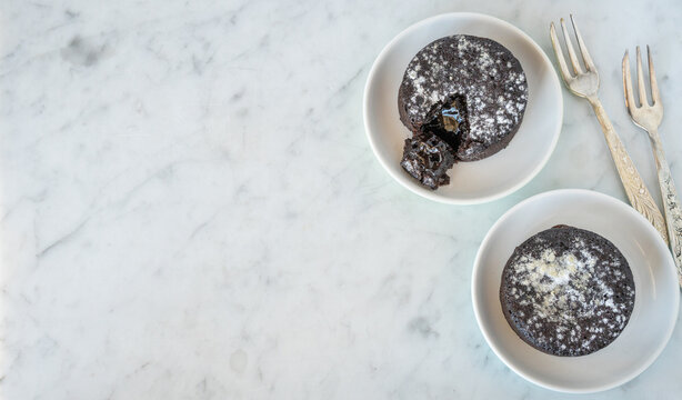 Decadent Chocolate Lava Cake On Marble Background From Above With Copy Space