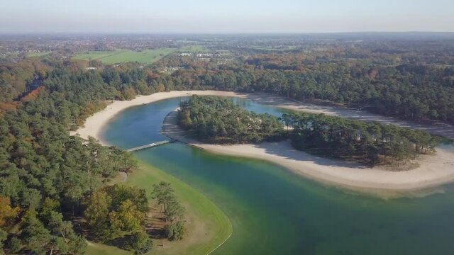 Aerial drone view of the tropical paradise recreational place the Henschotermeer in Utrecht the Netherlands, Europe.